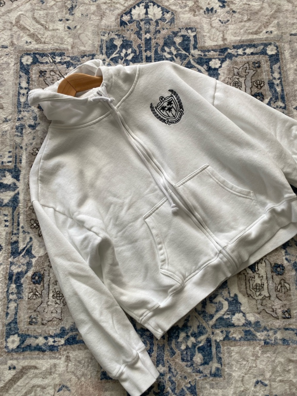 Like new! PINK White Zip-Up Hoodie with Crest Logo